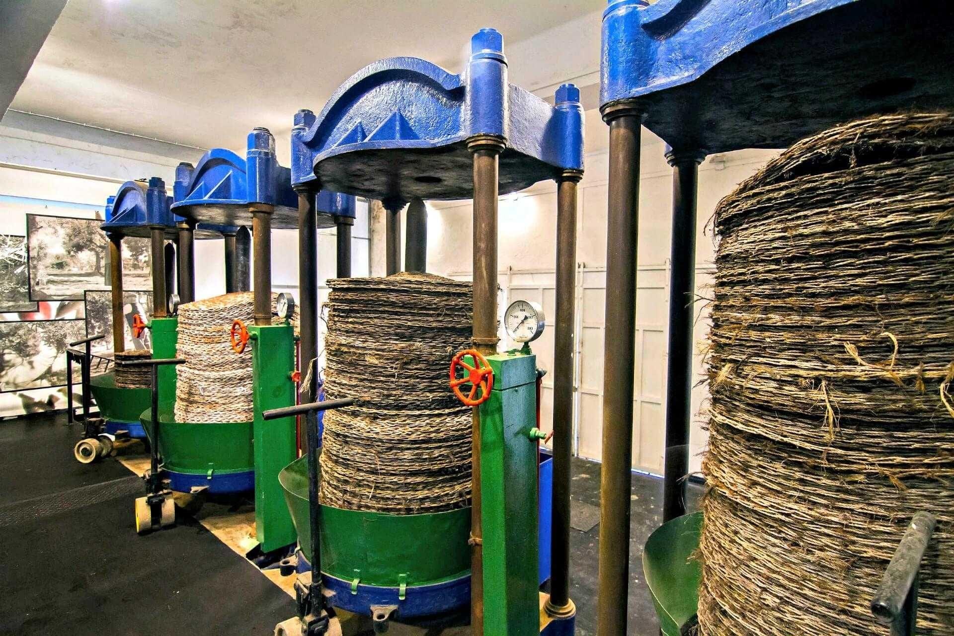 Original 1982 hydraulic olive press — Ward mill heritage